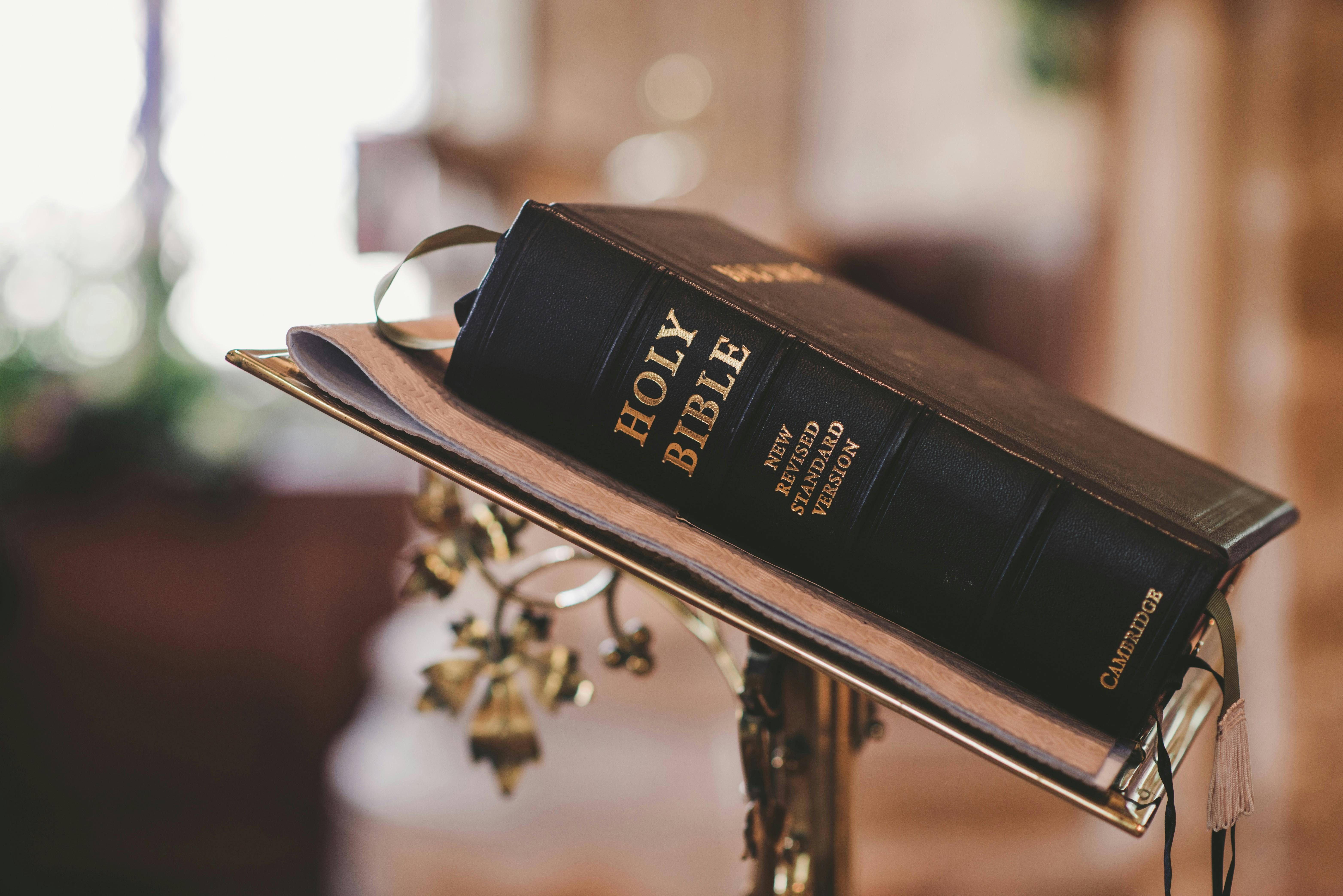 Photo by Pixabay: https://www.pexels.com/photo/holy-bible-on-stand-372326/